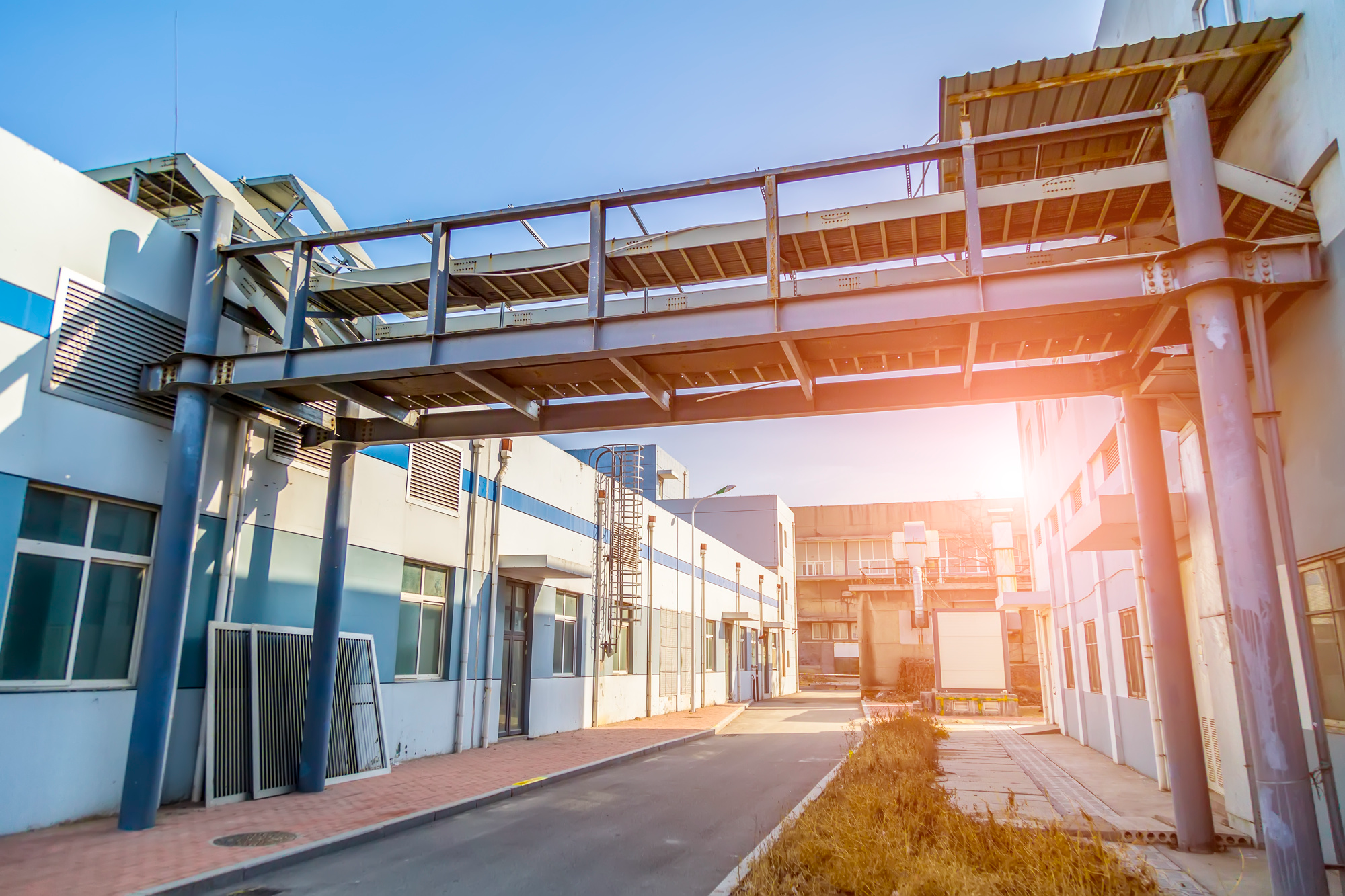 A commercial building - https://www.freepik.com/free-photo/building-scheduling-metal-tomatoes-entrance-hall_1251075.htm#fromView=search&page=1&position=13&uuid=a7bc9058-d595-4cb6-a947-047011a4af30&query=buildings%2C+warehouse%2C+offices