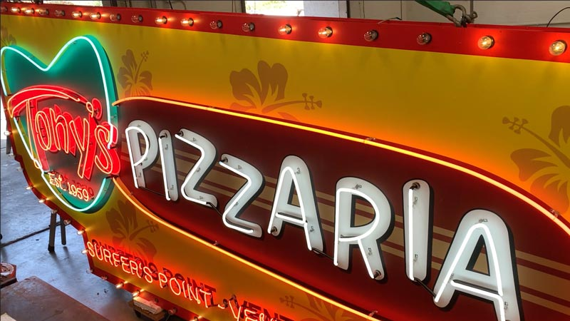 Building Signs – Tony's Pizzaria marquee neon sign with casino lighting - Sign fabrication and installation in Ventura, CA.