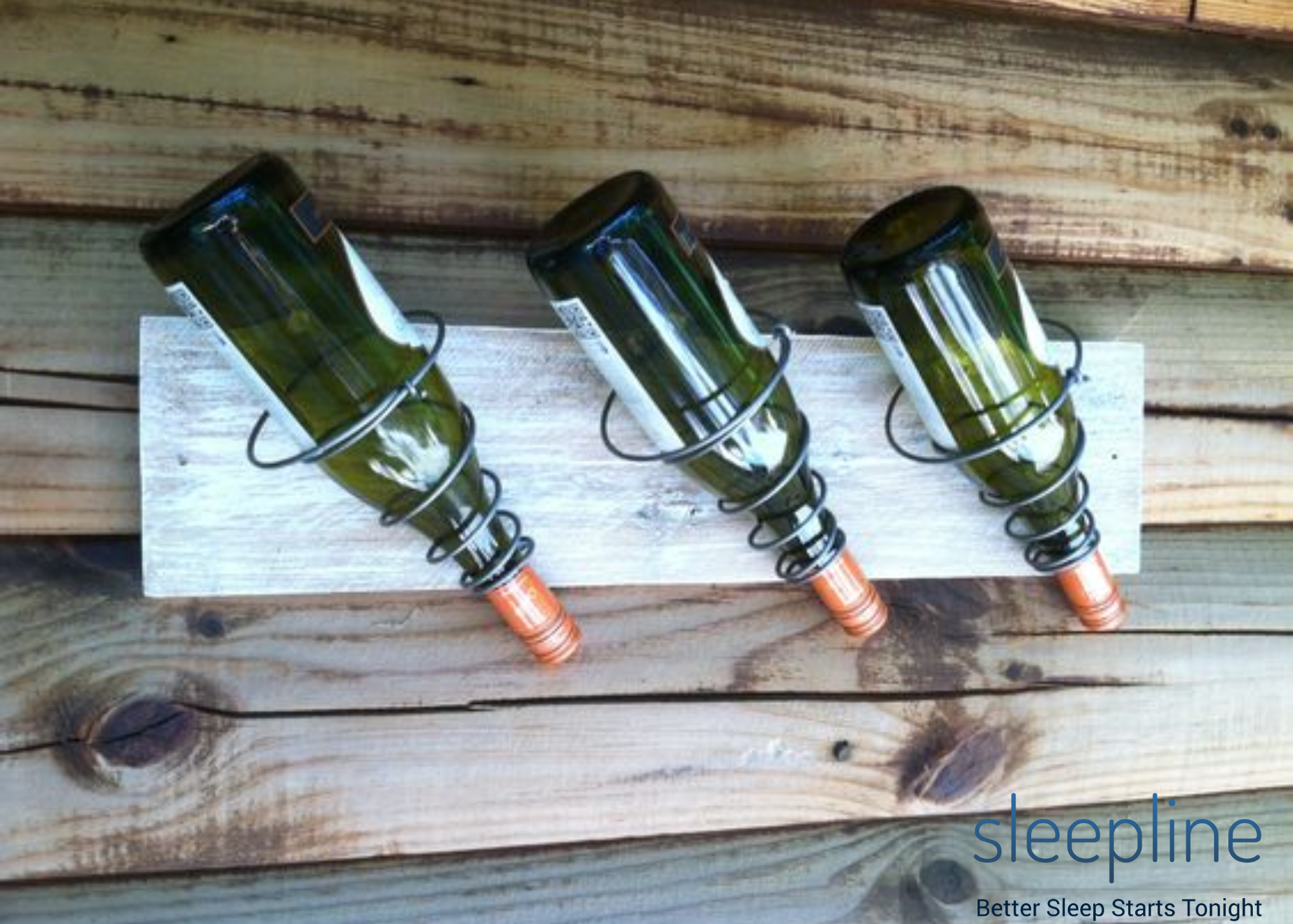 Wine bottles in repurposed mattress springs