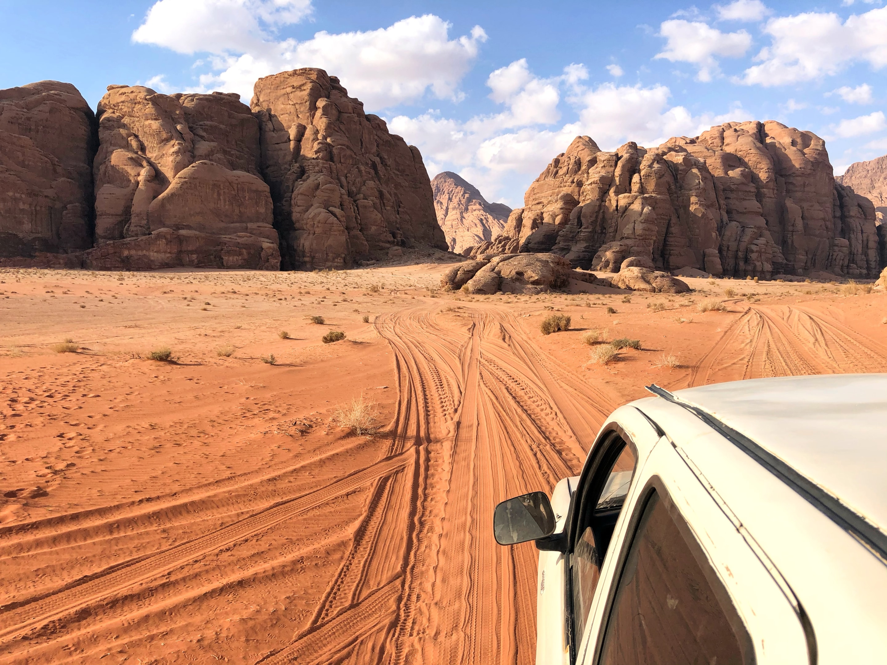 Desert views of red sand and rocks in Wadi Rum, Jordan