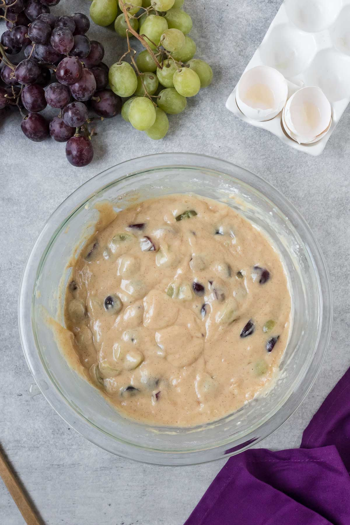 grape bread batter in a bowl