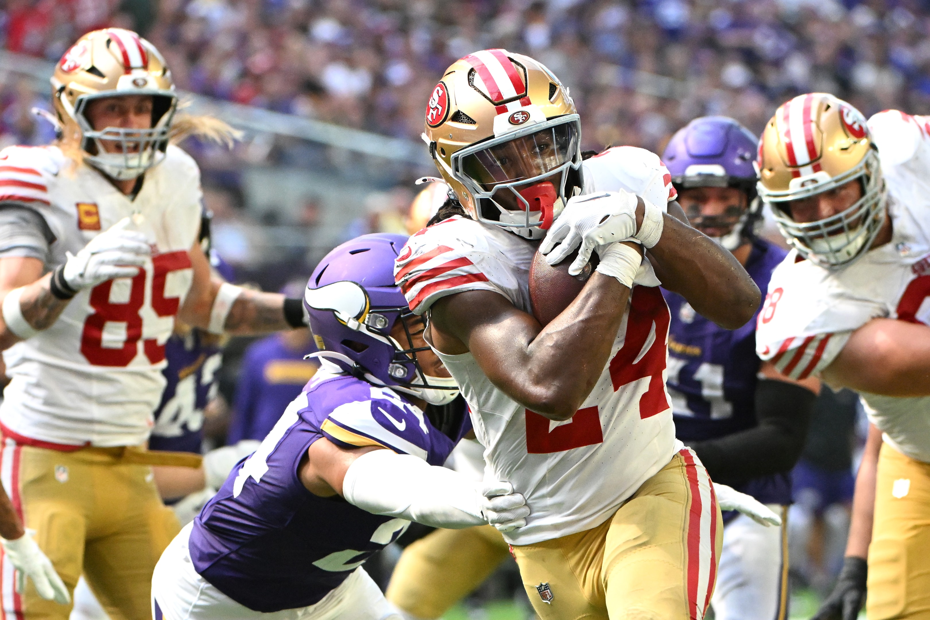 Jordan Mason of the San Francisco 49ers scores a touchdown on September 15, 2024.