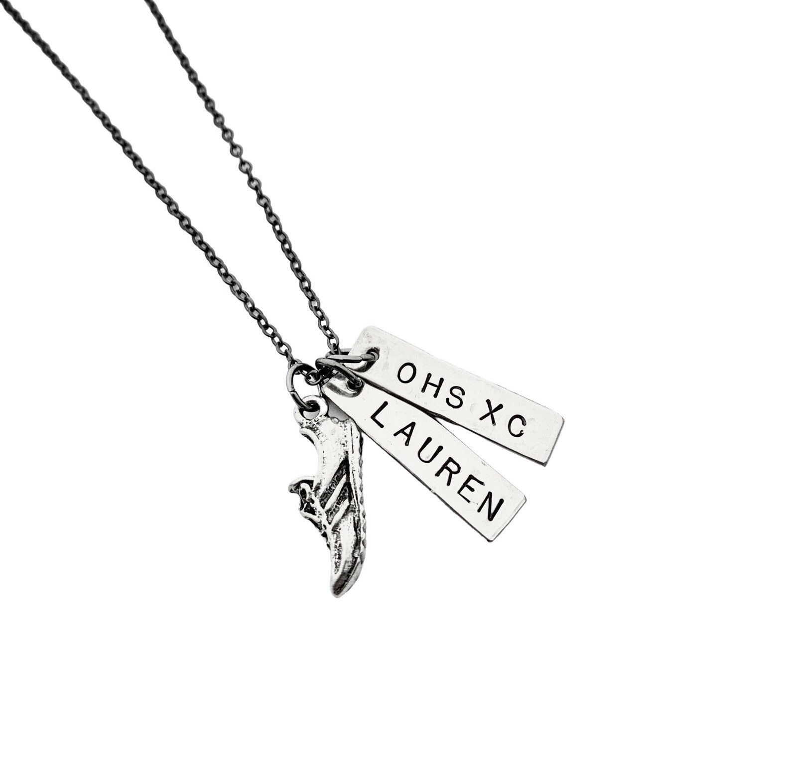 This cross country necklace is handstamped by a leading seller on Etsy: TheRunHome.