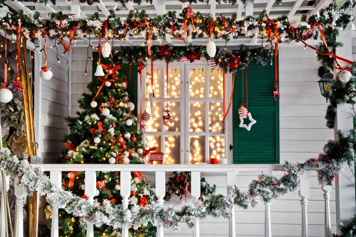 A beautifully decorated window sill showcasing various window decorations for Christmas cheer.