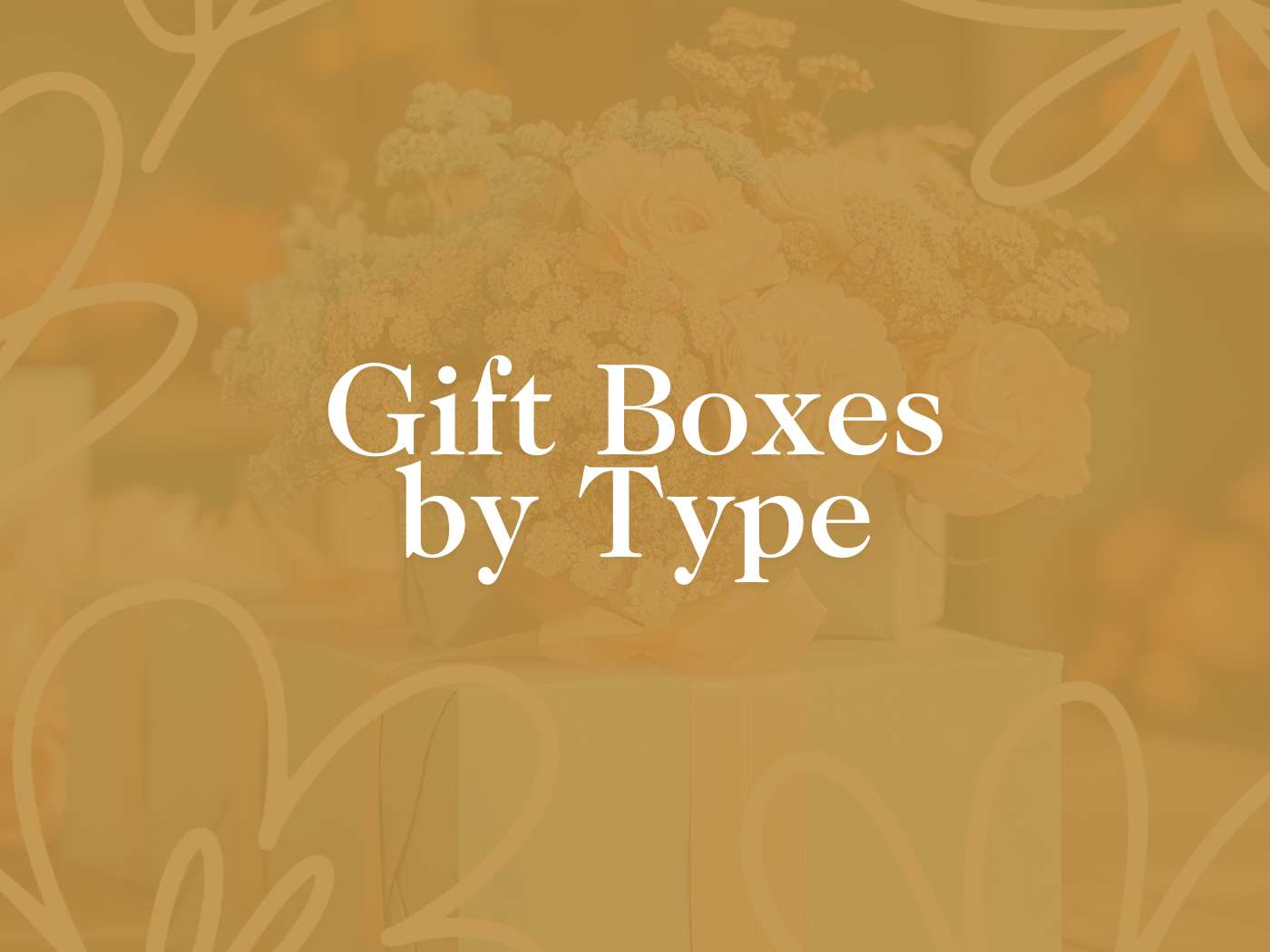 Elegant display of various Gift Boxes by Type, adorned with soft floral arrangements in a muted color palette, showcasing the range available at Fabulous Flowers and Gifts.