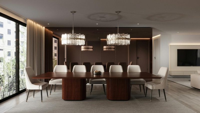 Long and extended dining table with multple light fixtures at approximate diameters