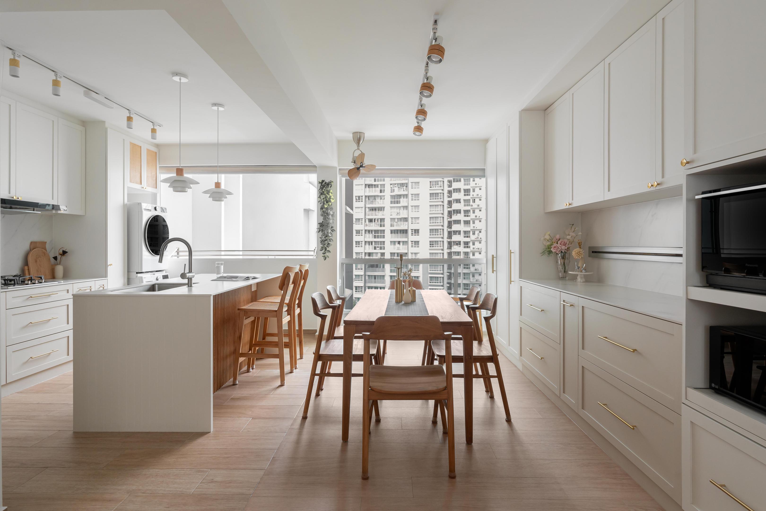 An interior designer and homeowners are gathered in a bright modern apartment, reviewing various material samples to enhance their renovation project. The space is filled with natural light, showcasing clean lines and aesthetically pleasing designs, as they collaborate to create their dream home.