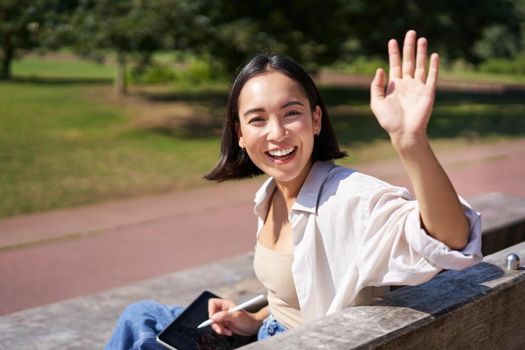 Happy girl waving hi