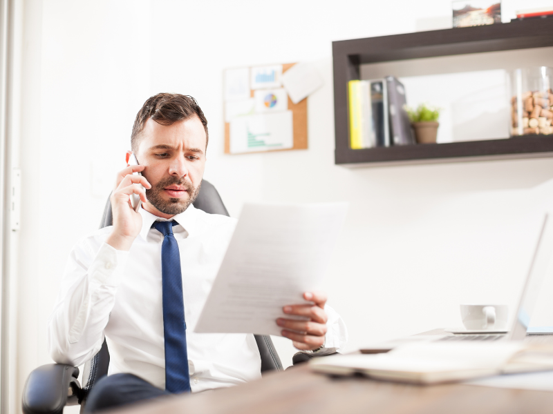 Image of a personal injury lawyer reviewing an accident report.