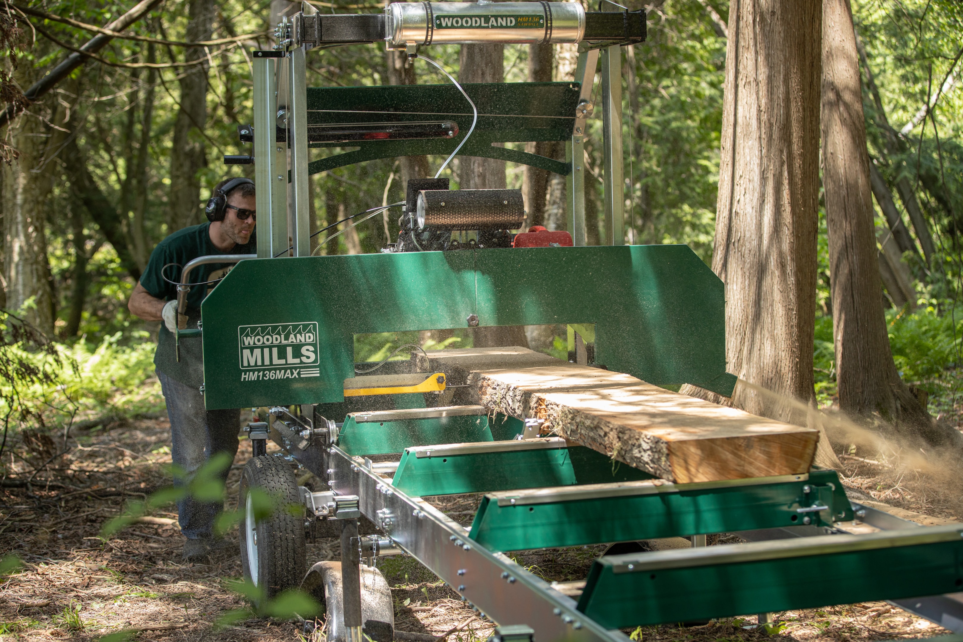 A trailer mounted HM136MAX Portable Sawmill. 