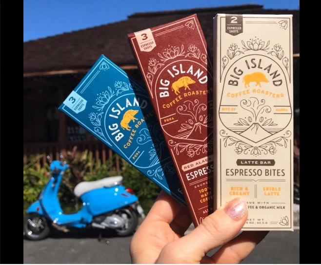 hand holding three Big Island edible coffee bars