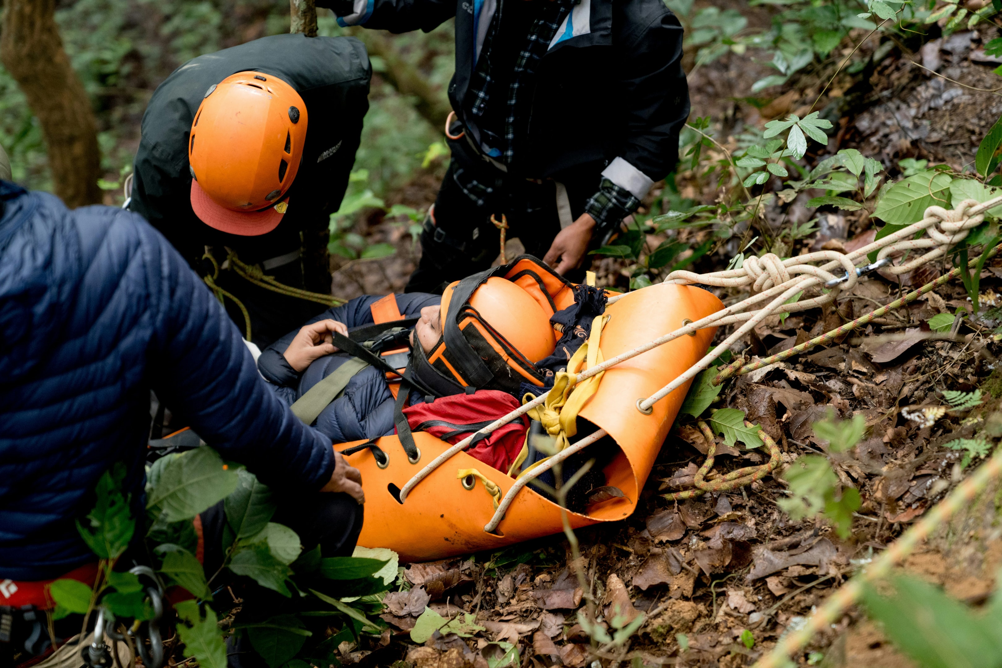 Proper techniques for safely using a stretcher during emergencies.