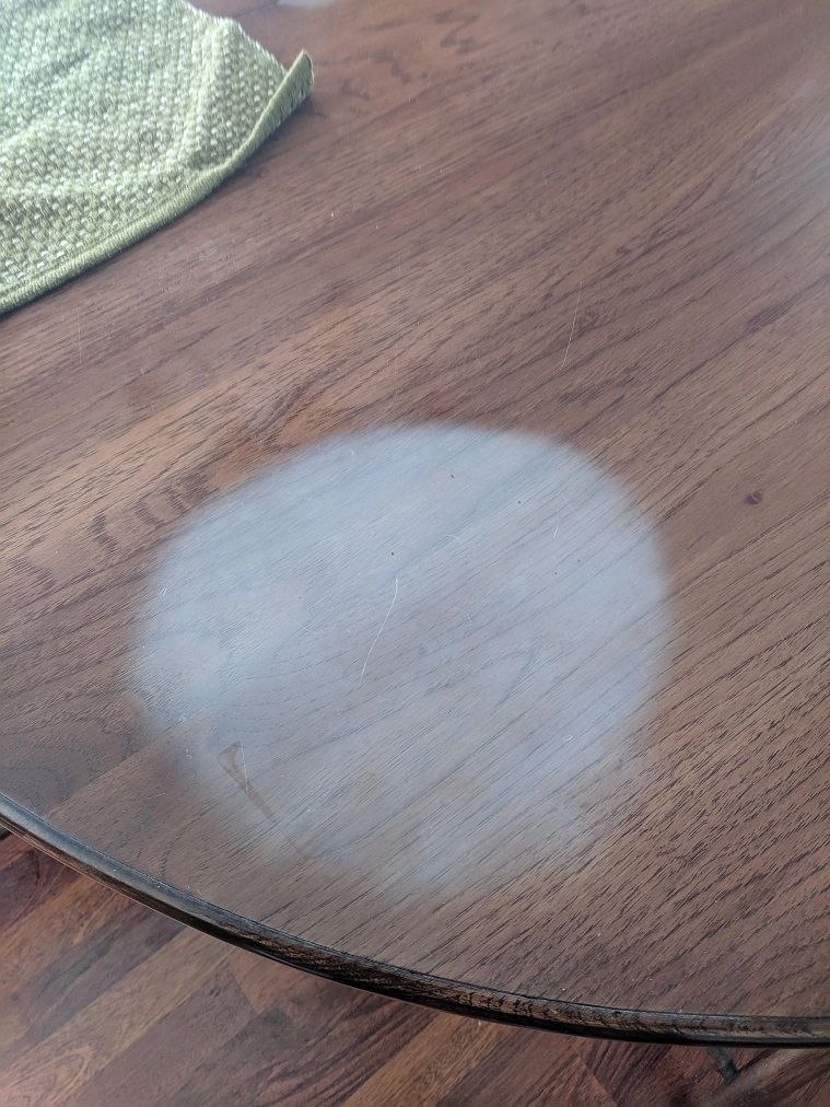 white burn mark on table