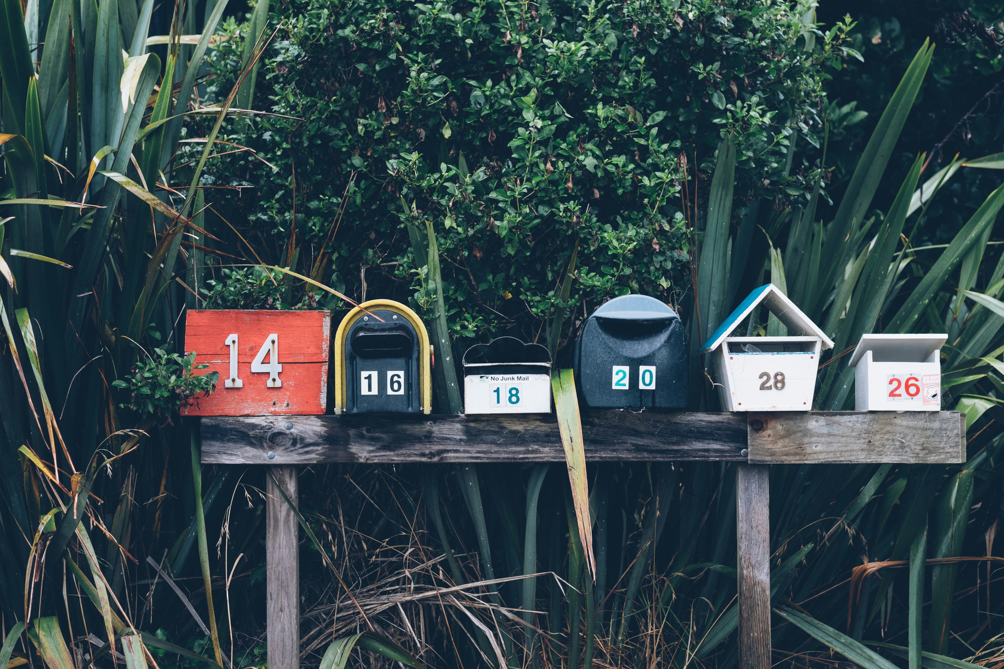 Mailboxes in front of group of senior-owned properties, being targeted by real estate investor.