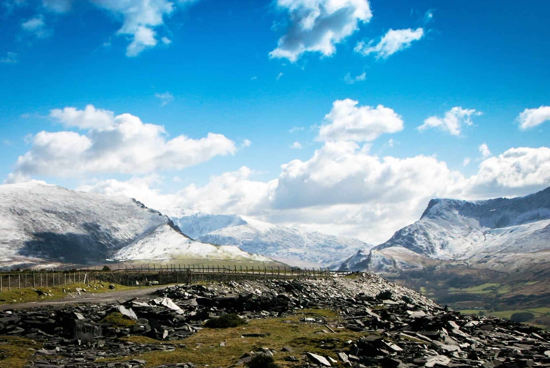 Snowdonia National Park with snow capped mountains in the distance