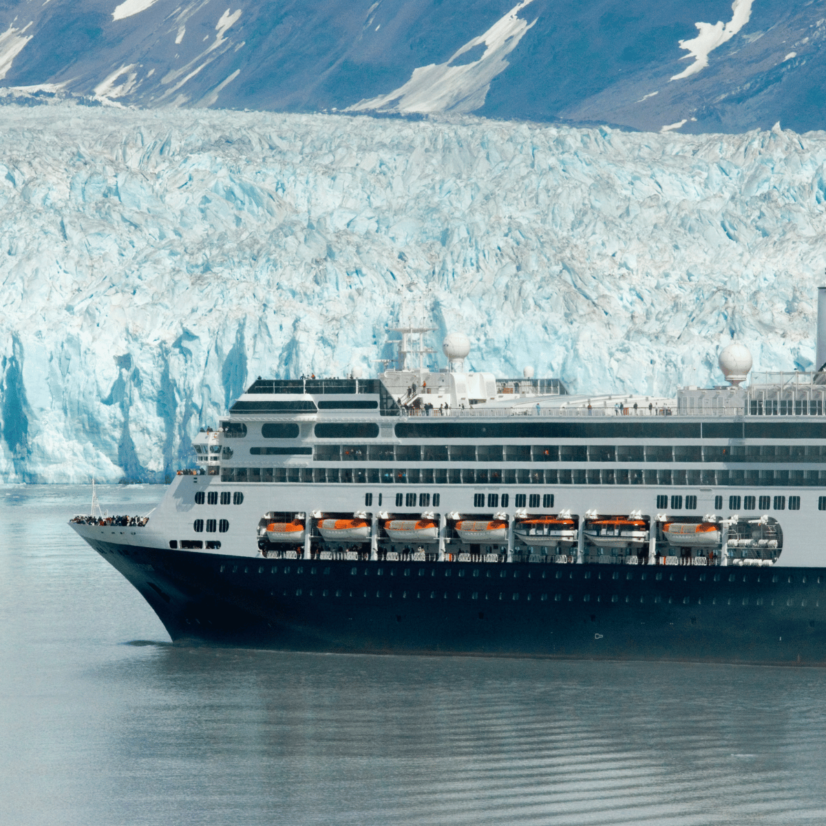 Cruise ship in front of glacier