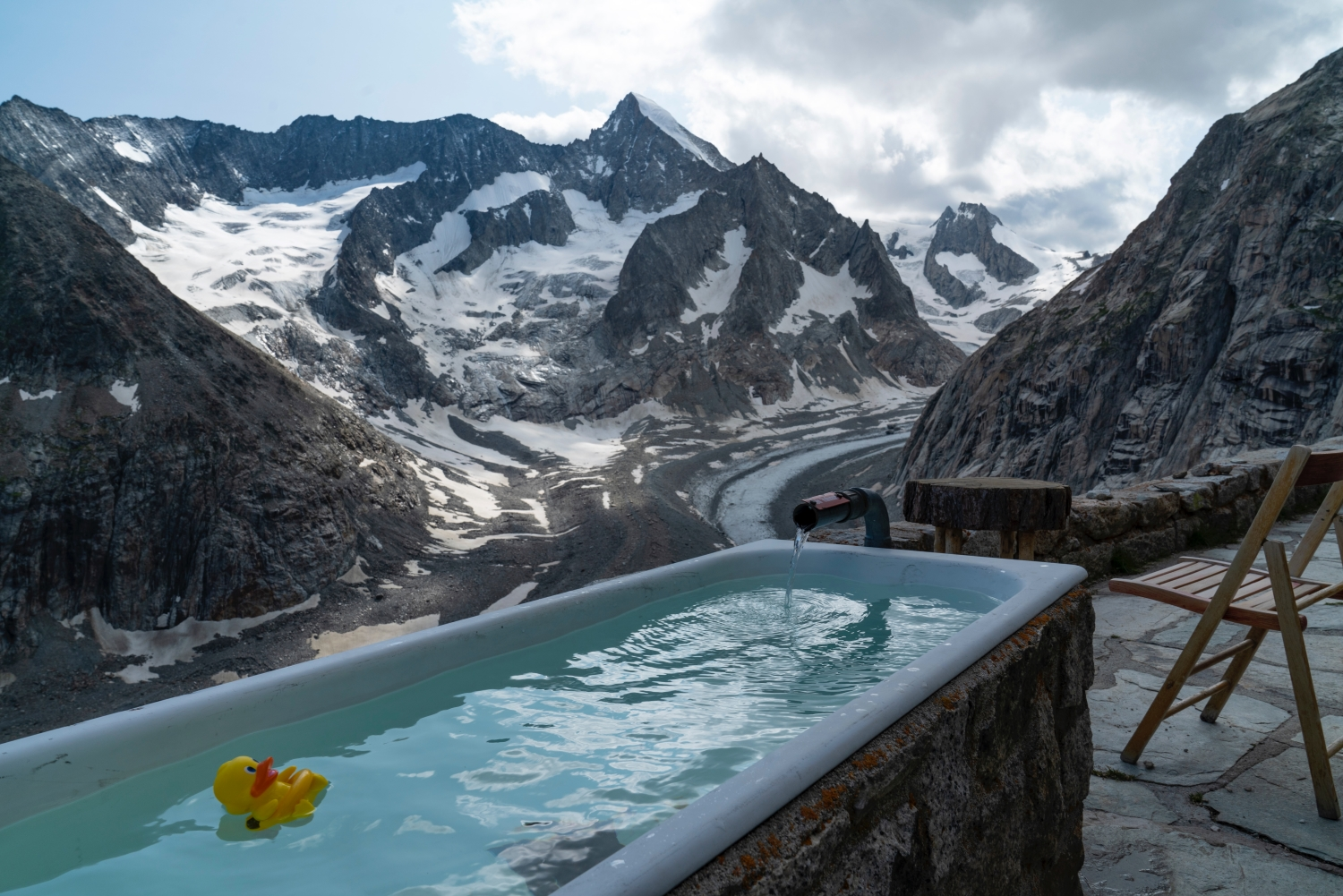 Cold Tub with mountains outside 
