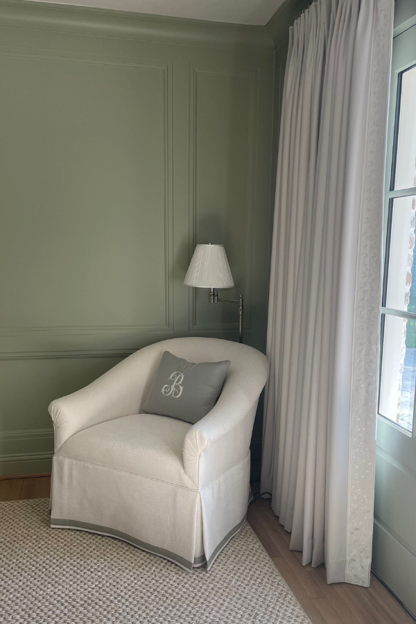 From the door to the window trim, once you have decided on a hue, you have to commit to color drenching like we did in this green s pace