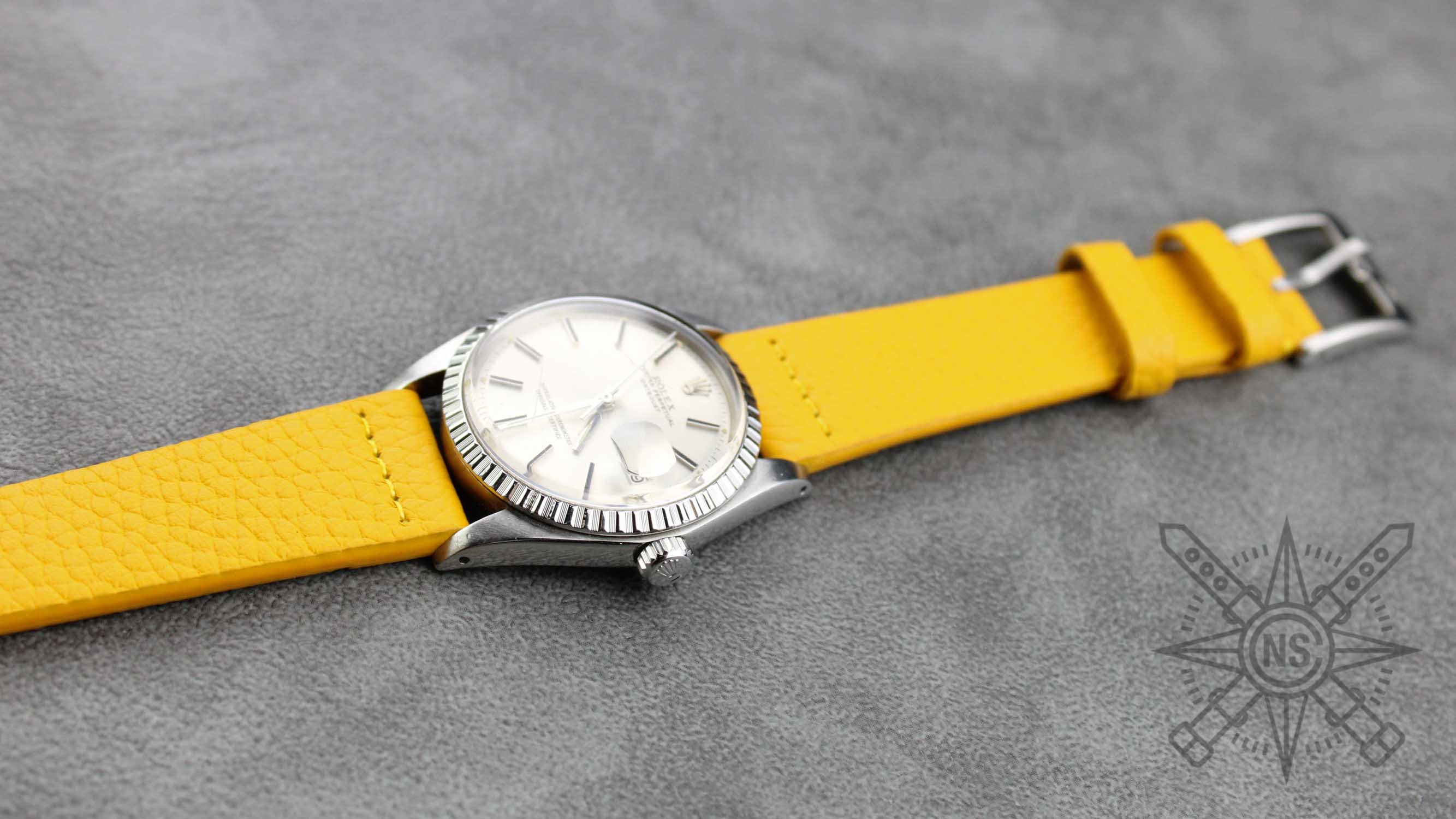 A stylish collection of watch bands in various colors and styles.