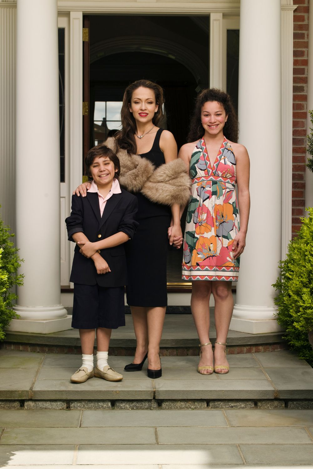 Wealthy family posing for a photograph