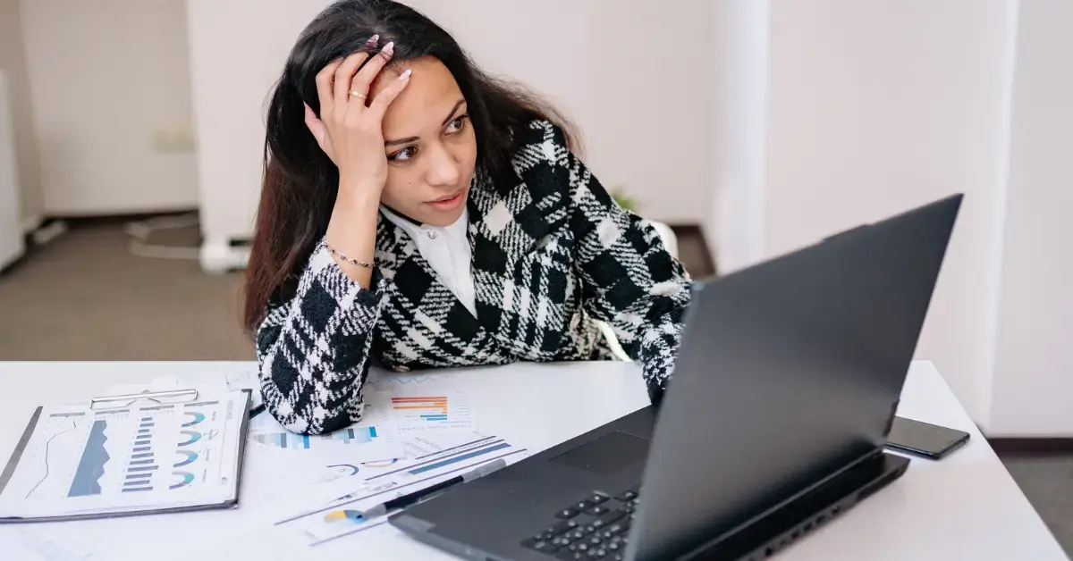 Woman learning how to read K1 distribution tax forms for her OnlyFans LLC and S Corp structure.