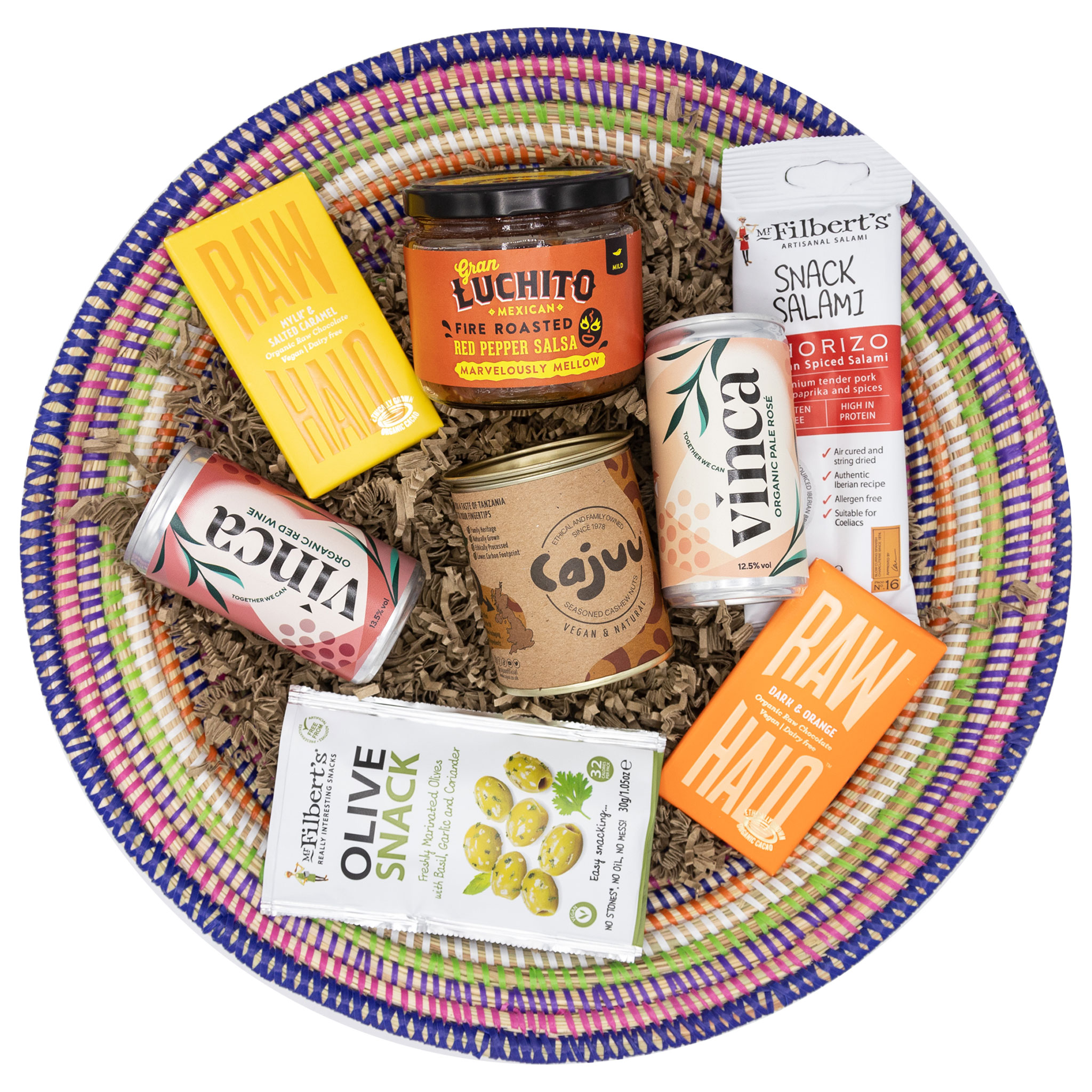 A selection of delectable treats sourced from responsible and sustainable producers presented in a handwoven African basket