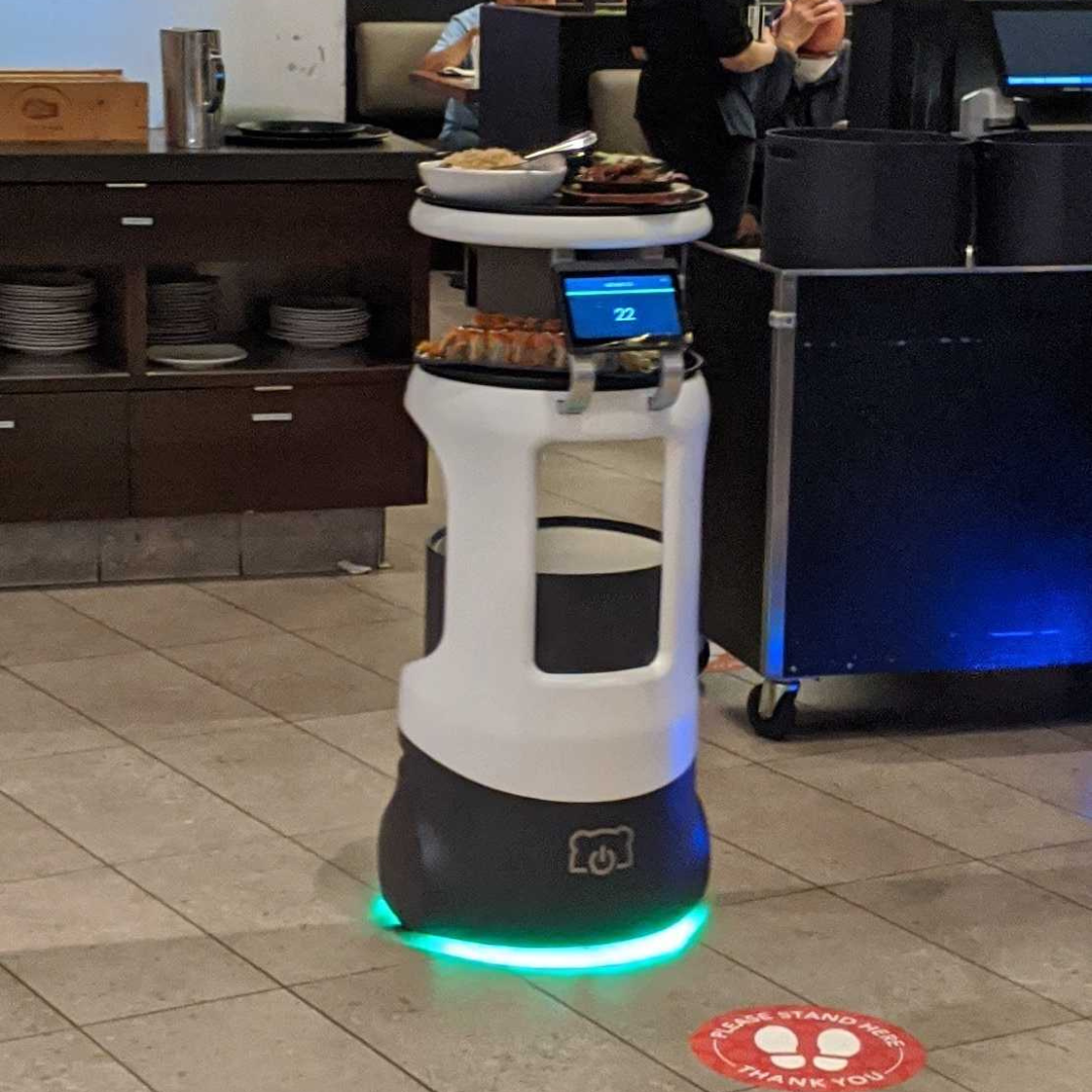 The international Servi AI robot helping with food running for the hotel which made its start in Japan.