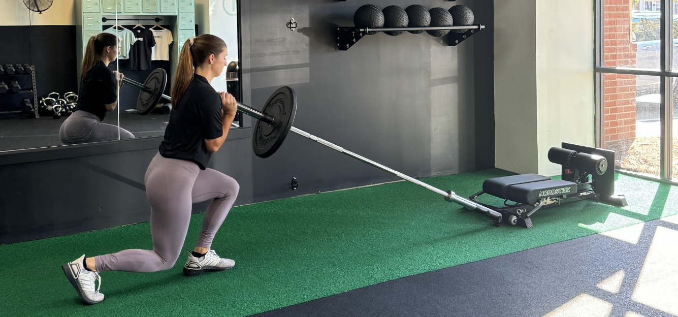 While the weight may be on  your upper body (shoulder blades), the reverse lunge is a good single-leg exercise. You put one leg forward, then do a reverse lunge. There's no need to overthink your foot position, descend in favor of the leg you want to work on, and let the other leg go back.