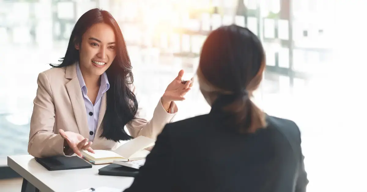 Woman discussing cancellation of debt income with tax professional for compliance.