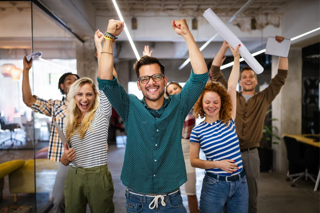 happy employees cheering