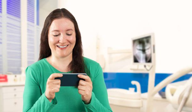 A patient using a mobile device to search for a local dental clinic