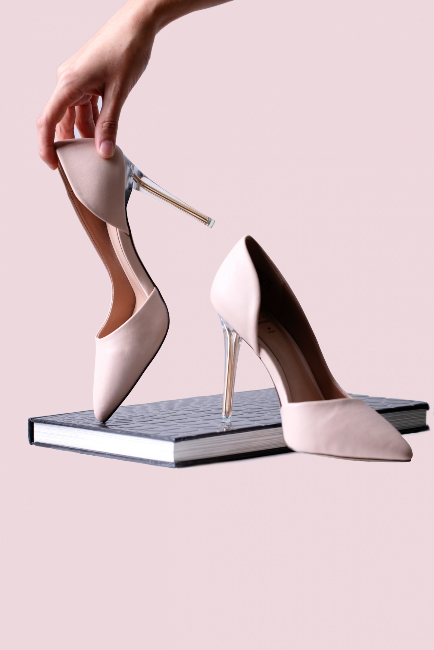 Commercial photo of pink stiletto shoes