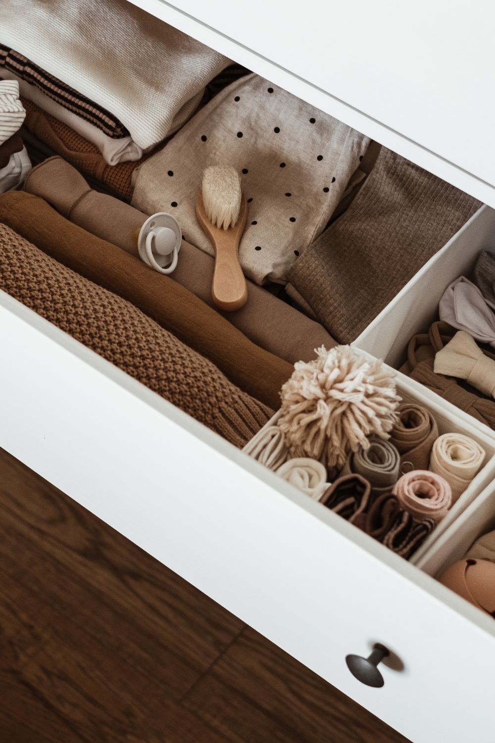 Drawer of baby clothes