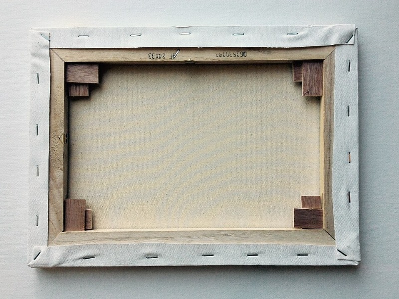 Canvas fabric stretched across a wooden frame