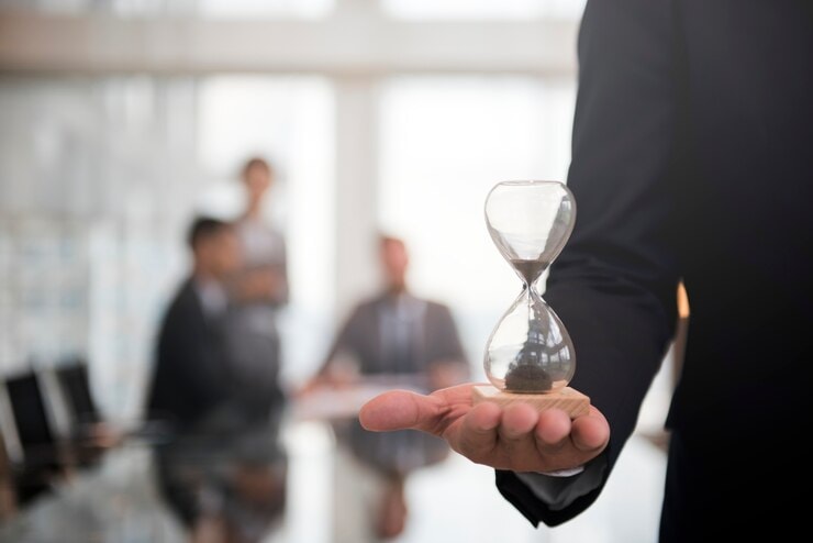 Man holding hourglass