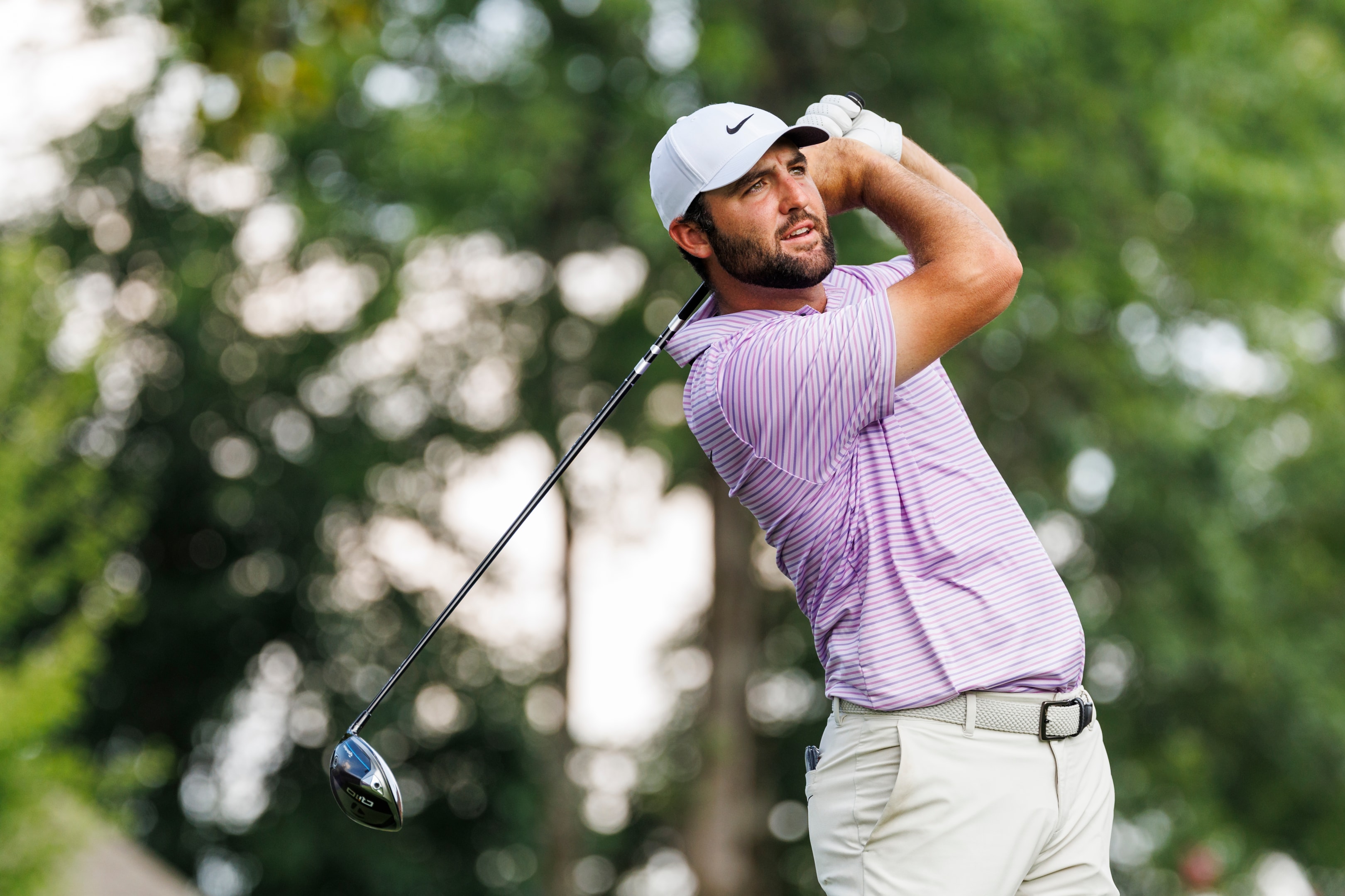 Scottie Scheffler of the United States plays his shot from the 16th tee during the first round of the FedEx St. Jude Championship at TPC Southwind on August 15, 2024 in Memphis, Tennessee.