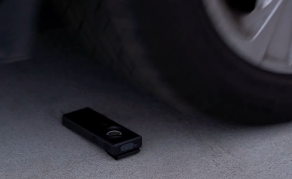 cyber tools flashlight being ran over by a car