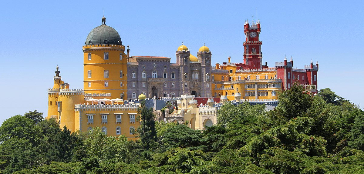 A breathtaking view of Pena National Palace and Parque de Pena, a must-visit destination in Sintra for those wondering is Sintra worth visiting.