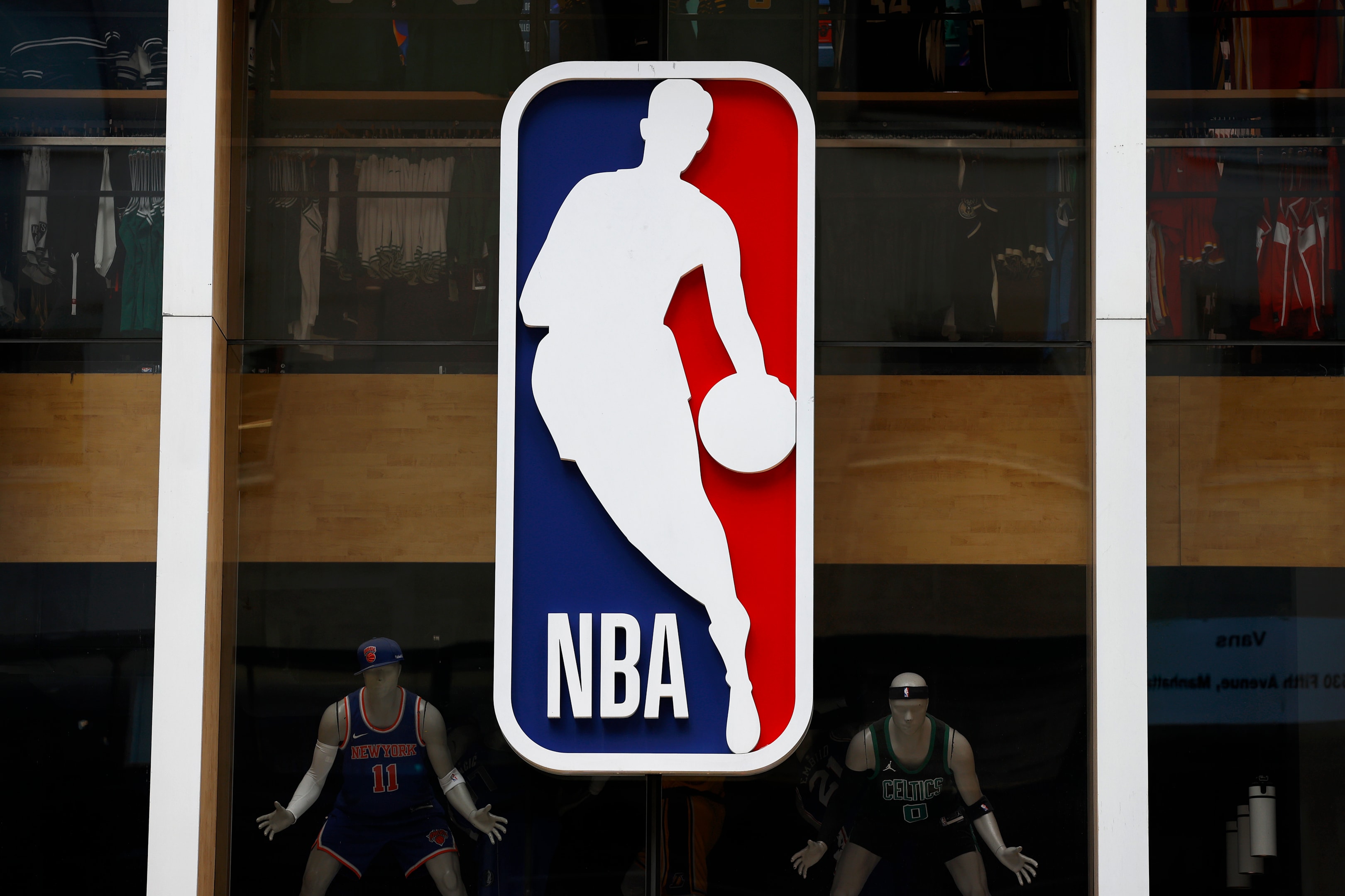 The NBA logo and emblem displayed outside the NBA Store on Fifth Avenue in New York City.