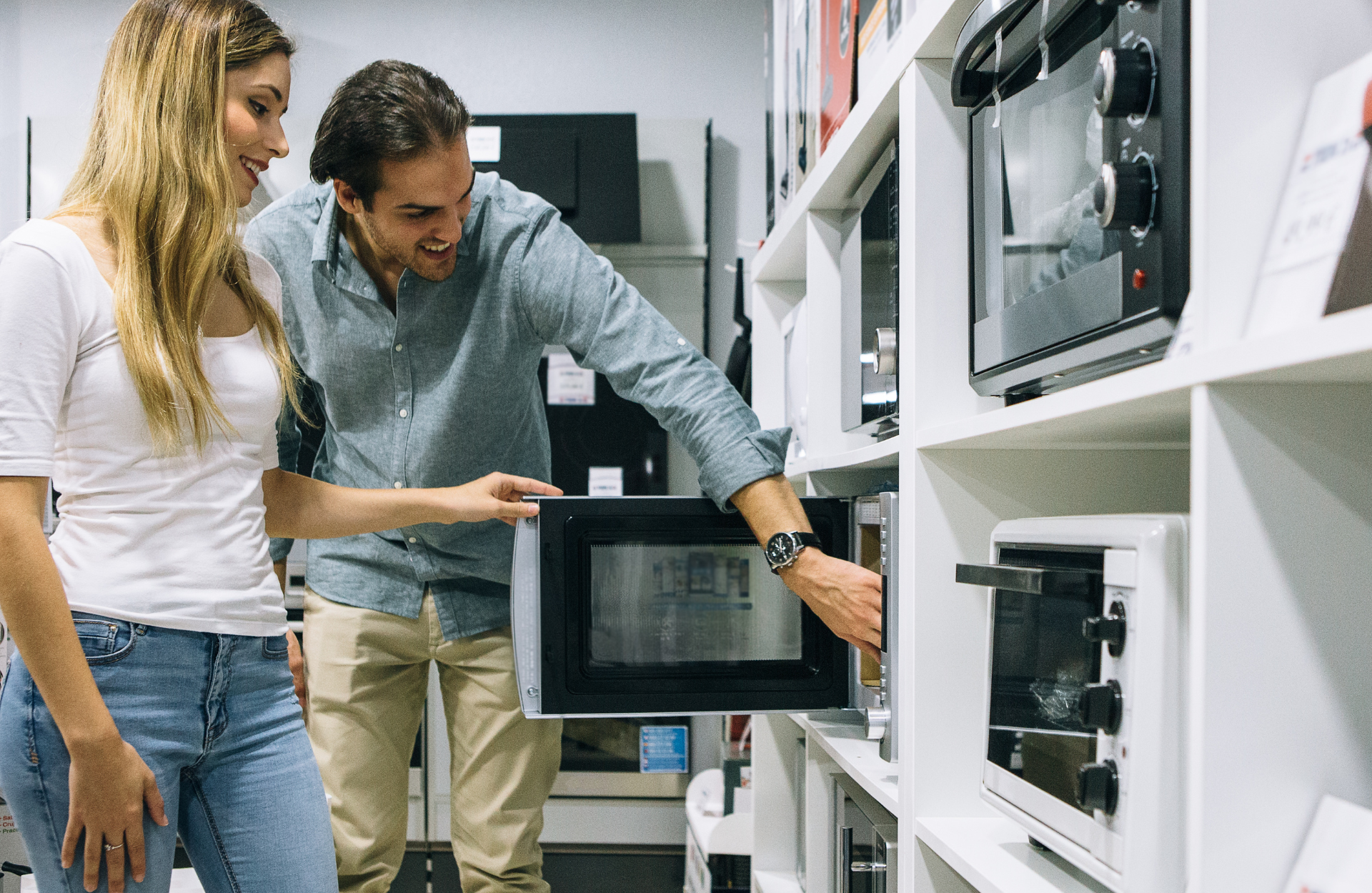 A couple choosing products in a physical store