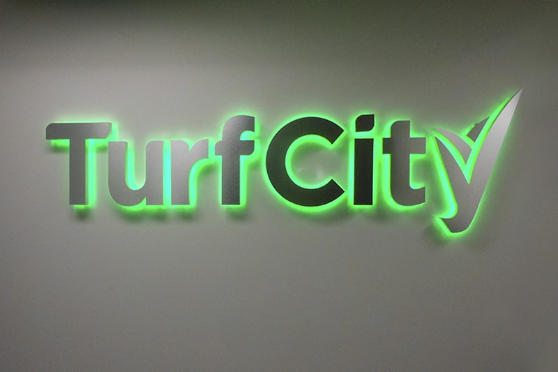 Turf City halo-lit channel letters interior lobby sign in Beverly Hills, California.