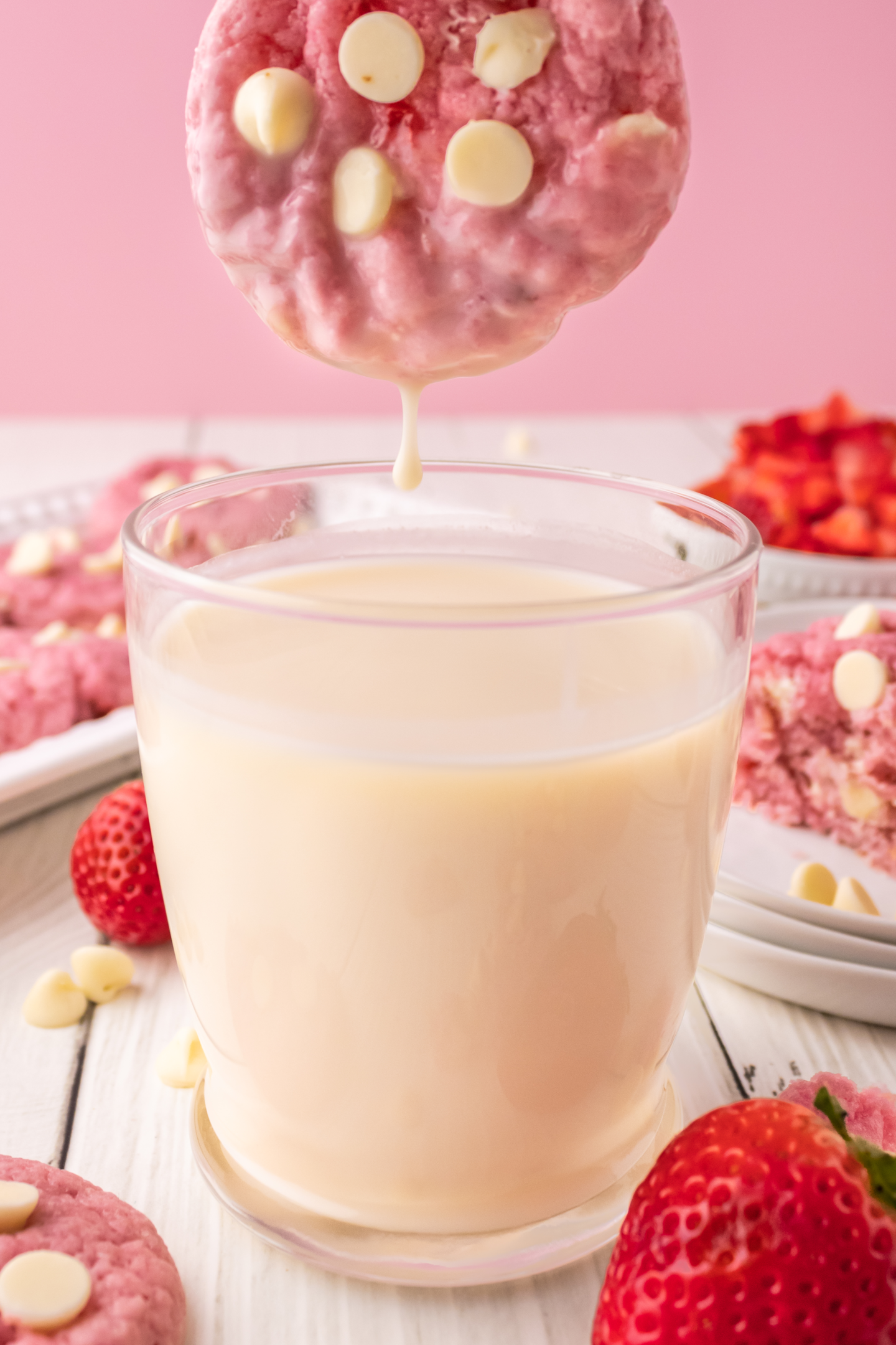 strawberry white chocolate chip cookie dunked in milk