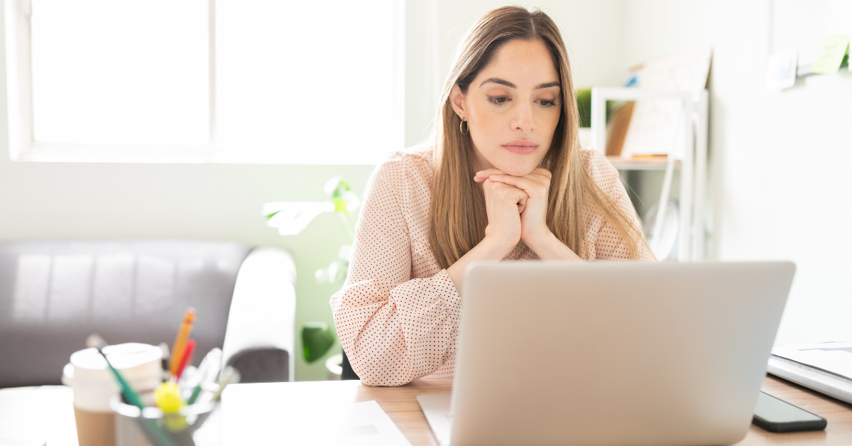 Woman reviewing her balance sheet to understand current and noncurrent assets for her OnlyFans business.