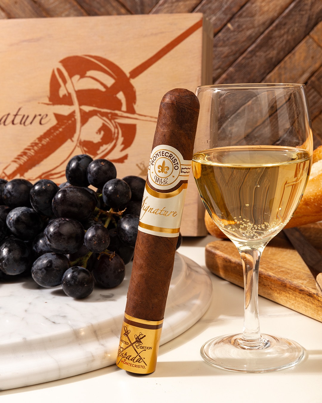 An imagen of a Montecristo Espada Signature Limited Edition Valiente pairing with white wine