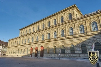 The majestic Nymphenburg Palace surrounded by beautiful gardens.