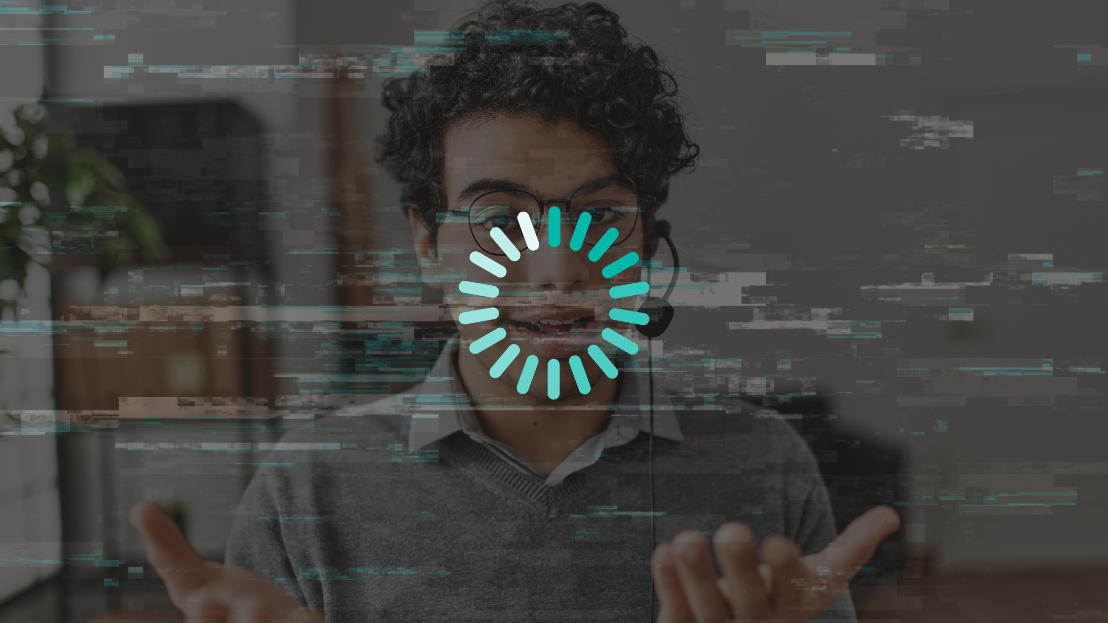 Glitched video call showing a stalled man, highlighting how limited bandwidth affects VoIP devices and other mission-critical devices.