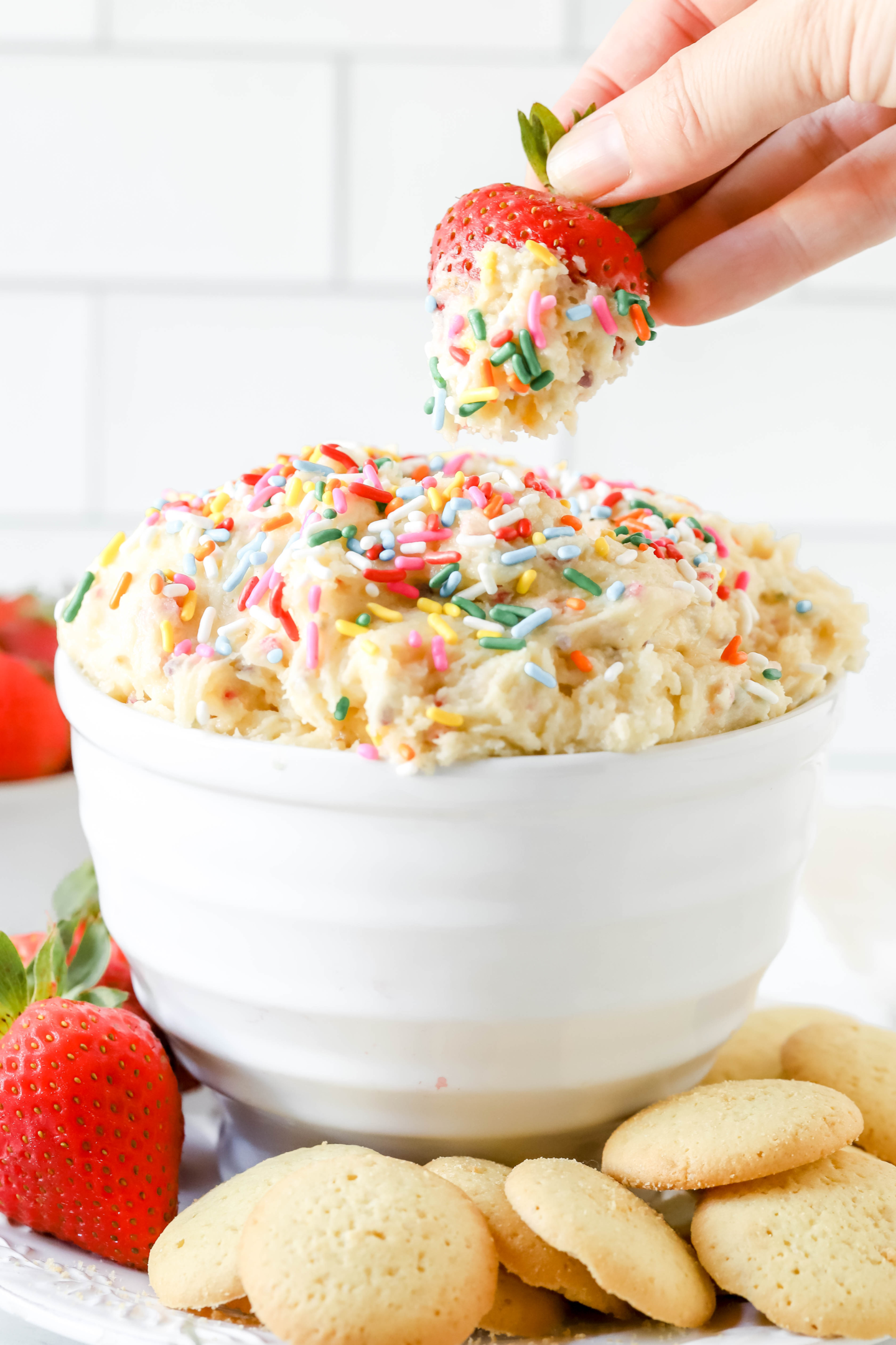strawberry dipped into cake batter dip