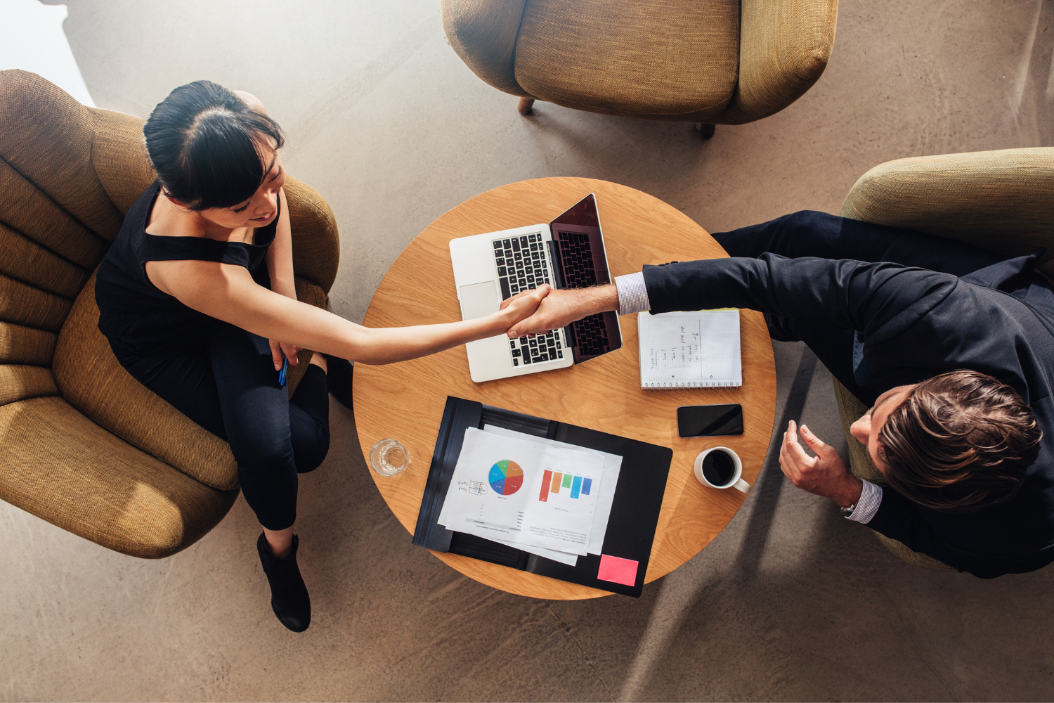 Two professionals shaking hands.