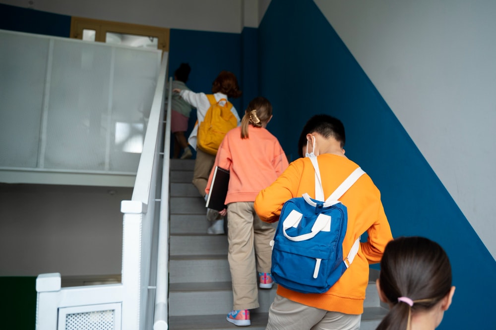 Students walking up the stairs after an emergency alert test with timely notifications.