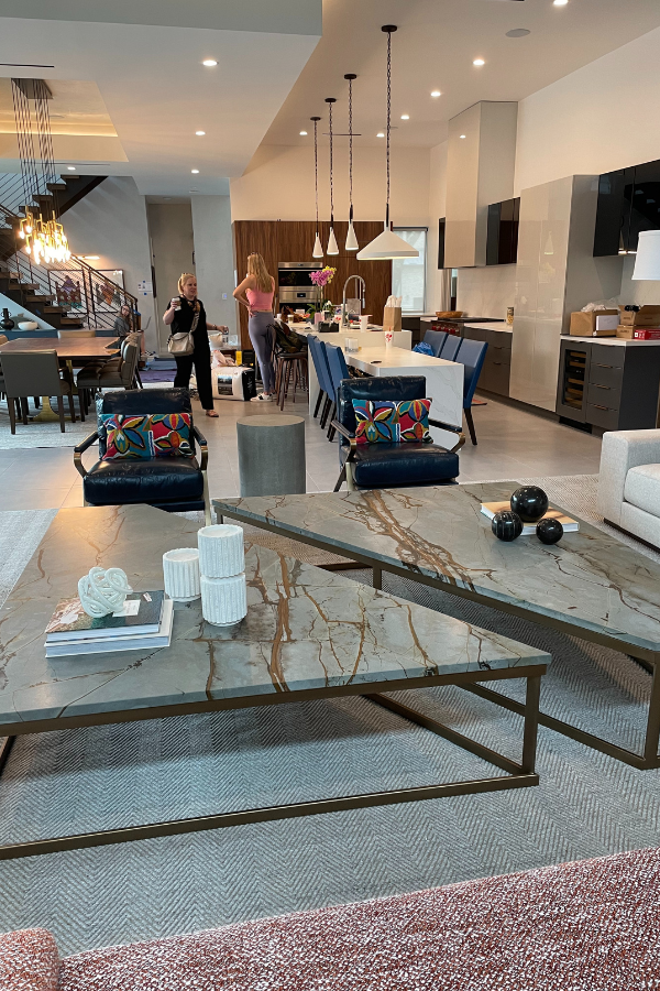 two designers meeting in a client's home during install